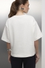 Kremowy T-shirt Base V-neck – widok tył, gładka dzianina Supima