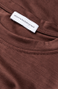 T-shirt Shape Monika Kaminska – detal metki i wykończenia karku. Certyfikowana wełna merino, bez poliestru.