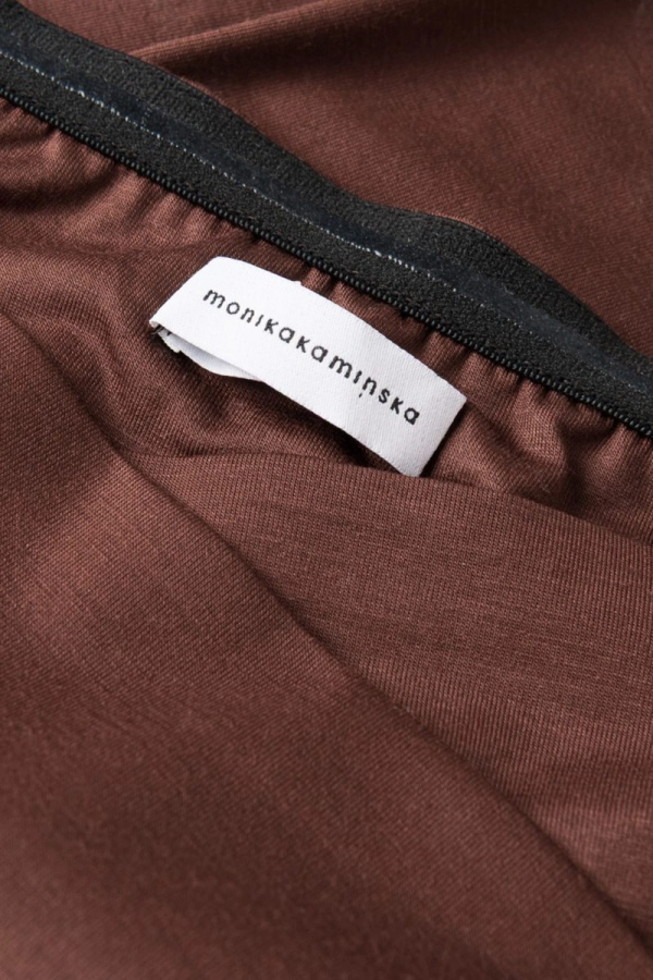 Legginsy sportowe Core V-waist z wełny merino, brązowe – detal metki